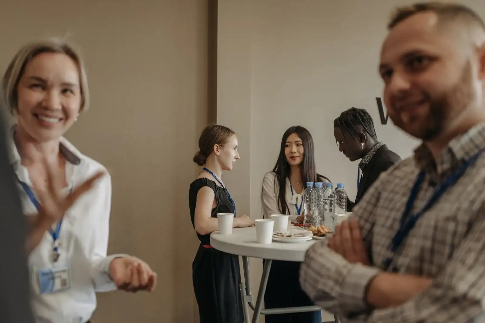 People talking during a business event break