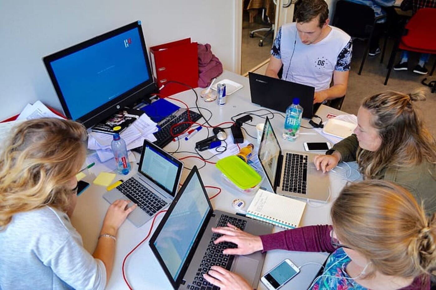 Founders gathered around a table at a working session